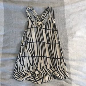 Creme and black high low tank